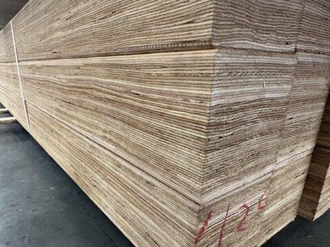 LVL is manufactured by bonding multiple thin layers of wood veneer with strong adhesives.